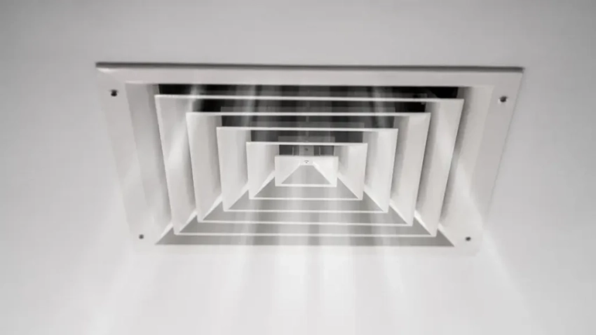 Photo of a large ceiling HVAC vent commonly found in commercial office buildings